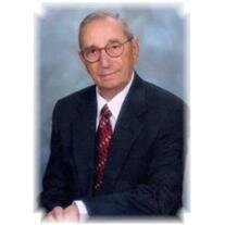 WILLIAM E. COZZO