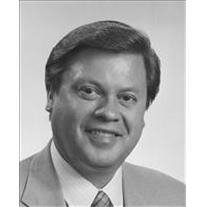 JAMES J. BAYUS