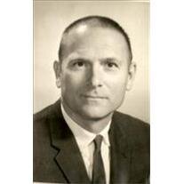 FRANK J. BOGGUST