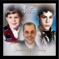 Justin M. Creely 