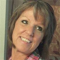 Debra "Debbie" Raymer