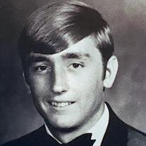 T. Larry Guest