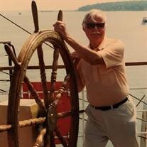 LAWRENCE A. BAKELAR