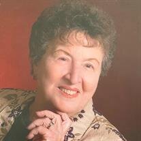 Theresa L. Christina