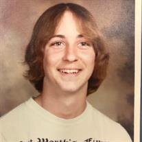 Charles "Chuck" Edward Crutcher Jr.