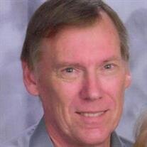 Mark K. Olinger