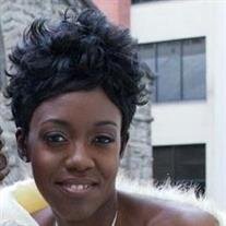 Quiana M Woodley