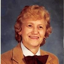 Nellie J. Raiger