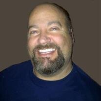 Mark A. Jewett
