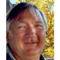 Travis    M. Colburn