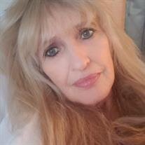 Virginia "Gini" L. Beaver