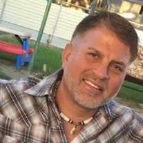 Ronald "Ron" E. Marquez