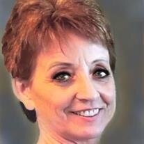 Lora "Lori" E. Brash