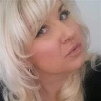 Mrs. Oksana Wilkinson