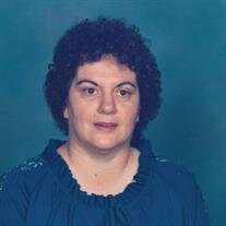Edna M. Crader