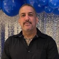 Santos Guzman Jr.