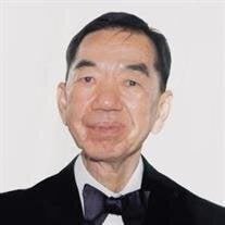 Mr Kwan Kit Cheung