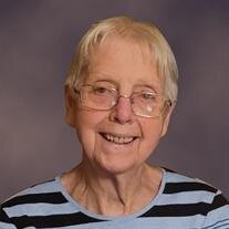 JOAN M. ARVIDSON