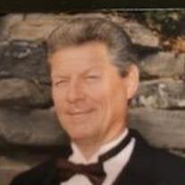 LYSLE E. BASSETT JR.