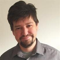 Adam K. Olson