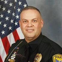Adam E. Miller