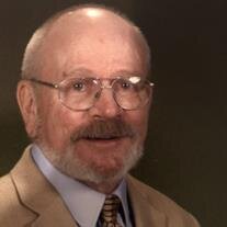 Charles B.  "Chuck" Tucker