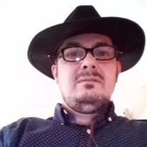 Luis E. Martinez "Quique"