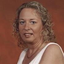 Cara L. Smude