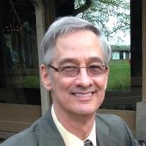 John E. Karolczak