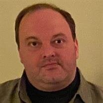 Mr. Michael J. Carignano