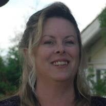 Kimberly M. Ginther