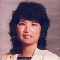 Mrs Yuk Yee Fong