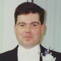 KEVIN W. McTOMANY