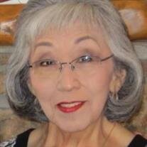Elaine T. May