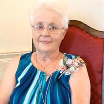 MRS. BELLE ADAMS