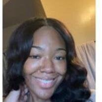 Ms.  La'Kia De'Ann Adams