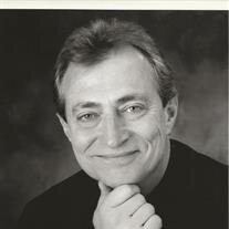 Thomas E. Kos