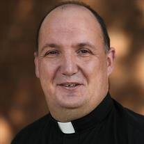 Rev. Mark P. Dunne