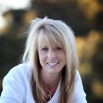 Suzette E. Witty