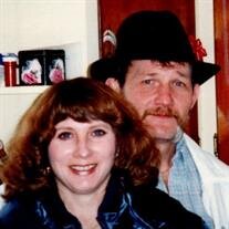 Thomas "Tom" E. Tilton