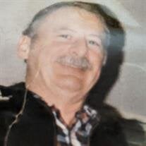 THOMAS "TOM" E. DUNN