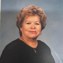 AURORA E. MARTINEZ