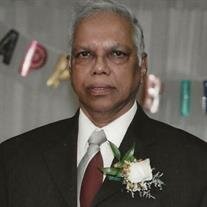 Ernest J Arjune