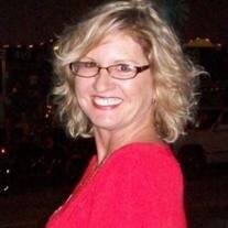 Ms. Elfi Parrish