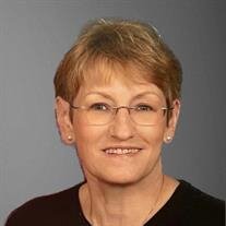 Judith E. "Judy" Miller