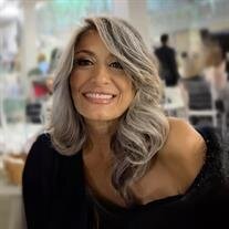 Ms Carla A Mellace