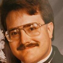 Eric L. Heikes