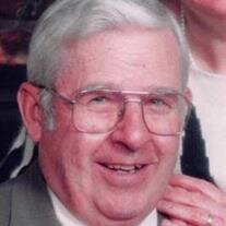 Ralph E.  Koogler