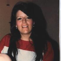 Joan E. NODLAND