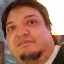Miguel A. Flores